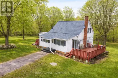 This enchanting 3-bedroom country home sits on a generous 1.5-acre lot in the heart of farm country...