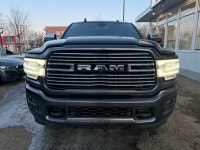 2020 RAM 3500 Laramie — Gray exterior, Black interior. Powered by a Cummins 6.7L Turbo I6 diesel pro... (image 1)