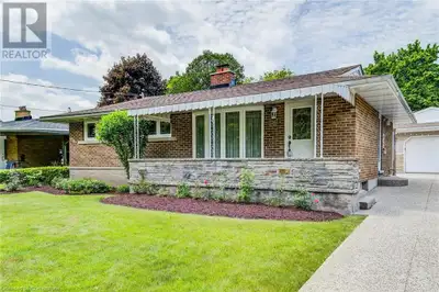 A HOME FULL OF CHARM AND ENDLESS POSSIBILITY. Tucked away on a quiet, tree-lined street in one of Wa...