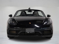 The 2018 Porsche 718 Boxster GTS embodies the essence of open-air performance with its mid-mounted 4... (image 8)