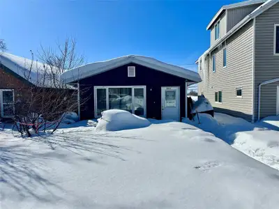 R43//The Pas/IDEAL INVESTMENT PROPERTY CLOSE TO ALL AMENITIES! Duplex with a 2 bedroom, 1 bath suite...