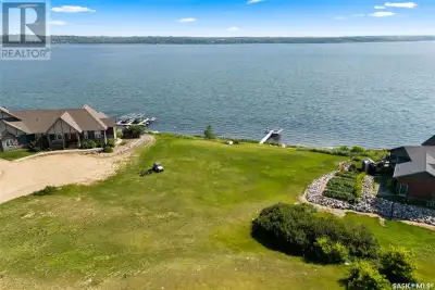 The lot is to be sold with adjacent house at 5 Kiiswa Point (MLS #SK013979) .25 Acres, 120 feet of w...