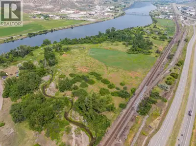 Trophy riverfront land parcel for sale within city limits. 9150 Trans-Canada Hwy is a 50+ acre prope...