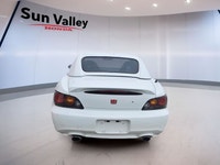 Feel the wind in your hair as you cruise the open road in a Honda S2000. With keyless entry for conv... (image 3)