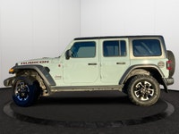 This Jeep Wrangler has a dependable Regular Unleaded V-6 3.6 L/220 engine powering this Automatic tr... (image 1)