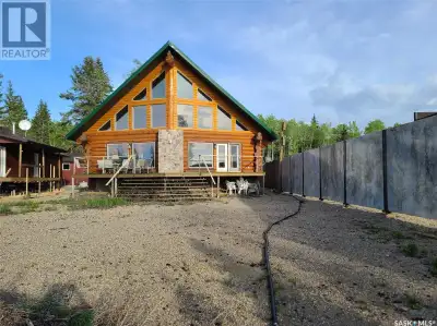 When you think of the ideal lakefront cabin, this is it! With a craftsman-built log home on a solid...