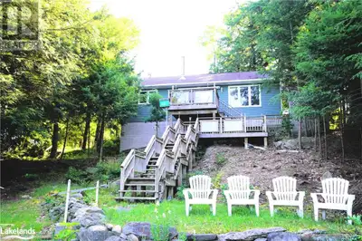 Welcome to your ideal lakeside retreat on Roberts Lake in Parry Sound! This charming two-bedroom cot...