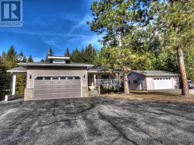 Visit REALTOR website for additional information. Situated on a gorgeous PARK LIKE 2 plus acres, thi...