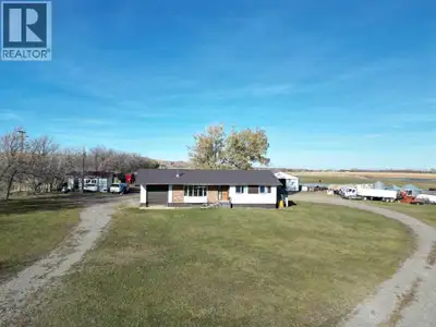 What a stunning view! This 40 acre more or less farm with residence next to Hill Spring has gorgeous...