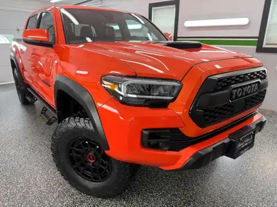 We have a RARE, SOLAR OCTANE 2023 Toyota Tacoma TRD PRO 4x4! This beast looks and drives incredible!...