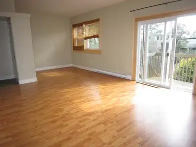 Two bedroom on a quiet south end street. Sunny open concept living/dining room with patio doors to a...