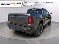 The 2026 Ram 1500 Rebel is the epitome of rugged sophistication. This Gray beauty, equipped with 44... (image 2)