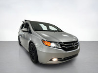 Our used family-friendly 2014 Honda Odyssey Touring is shown in stunning Alabaster Silver Metallic.... (image 6)