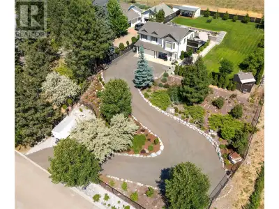 TIMELESS UPDATES MEET UNFORGETTABLE OUTDOOR LIVING SPACE! Set on an expansive, fully fenced lot with...