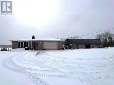 Welcome to 665 Coursol Rd! This well-maintained all-brick bungalow sits on 77 acres along a quiet co...