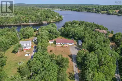 Your Mira River Dream Awaits at 166 Oakfield Drive. Experience unparalleled waterfront living, a cap...