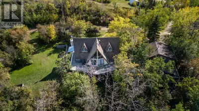 Prime lakefront location along the sandy shores of White Sands at Buffalo Lake! This vintage cabin i...