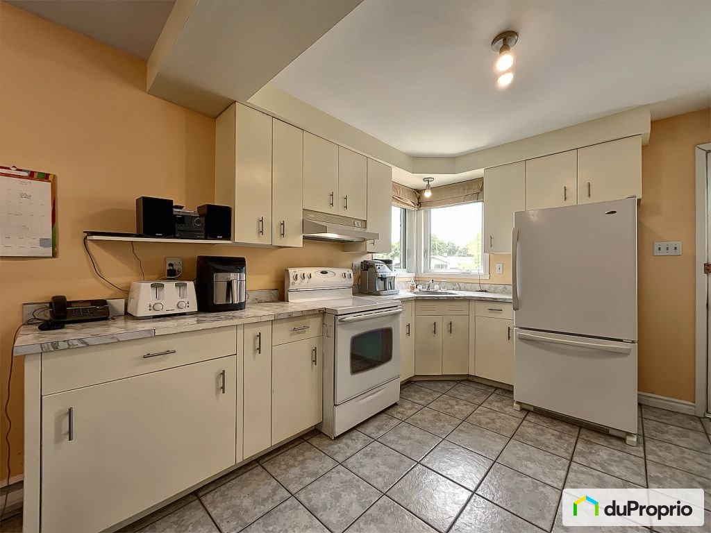 70e rue Est — photo 2