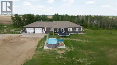 Outstanding acreage living in this immaculate sprawling bungalow located only 15 minutes from Camros...