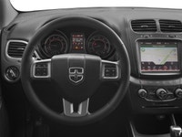 The 2017 Dodge Journey Crossroad, presented in a striking black finish, is equipped with an agile al... (image 3)