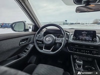 This *2023 Nissan Rogue SV* is powered by an efficient 1.5L I3 engine paired with a smooth CVT trans... (image 9)