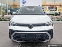 This 2025 Volkswagen Taos Comfortline, with a mere 12,750 kilometers, offers a harmonious blend of r... (image 7)