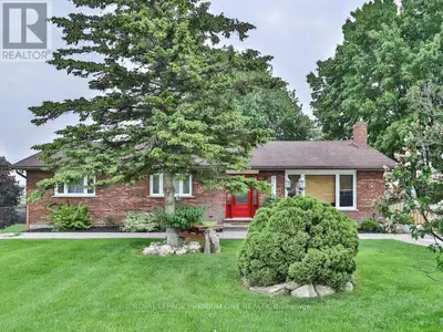 An Entertainers Dream! Welcome to this meticulously renovated bungalow, offering 3,500 sq ft of eleg...