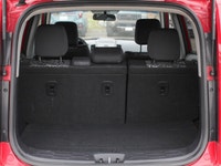 The 2011 Kia Soul 2u in a vibrant red with front-wheel drive is a vehicle built for handling the dem... (image 4)