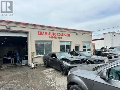 Prime Location! Ideal car dealership featuring 24+ on-site parking spaces and one hoist inside the b...