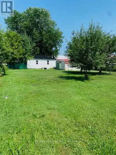 This charming bungalow sits on a stunning 75' x 200' lot, offering the perfect blend of peaceful cou...