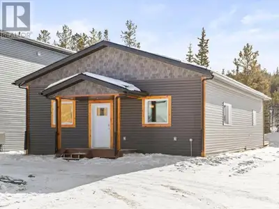 Perfect layout and full of charm! This rancher-style home by SPK Home Construction has a new interio...