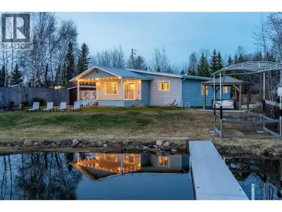 Renovated 3-bed, 2-bath home on beautiful Cluculz Lake. Set on a flat 0.89-acre lot with a sought af...