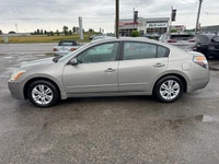 TIGER AUTO SALES LTD - Quality Pre-Owned Car Dealership - Located at 2275 Dundas St., London, Ontari... (image 1)