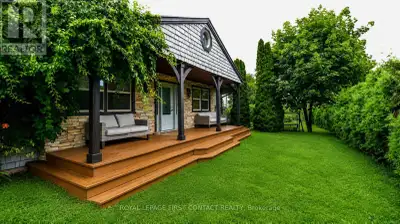Welcome to this private bungalow in sought after Willow Beach!.....with your own gated waterfront ac...