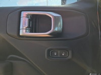 This Jeep Wrangler has a strong Regular Unleaded V-6 3.6 L/220 engine powering this Manual transmiss... (image 9)