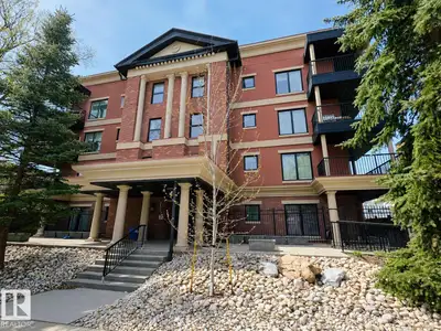Enjoy the comfort and quiet of concrete & steel construction in this well maintained top floor condo...