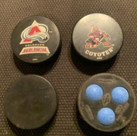 4 Hockey Pucks