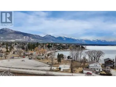 Right in the heart of Invermere, only a block to the Kinsmen Beach, splash park, and the shores of L...