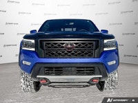 Awarded a 2024 IIHS Top Safety Pick, this striking blue 2024 Nissan Frontier Crew Cab Pickup excels... (image 9)