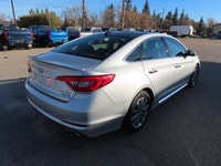 Recent trade in, 2016 Hyundai Sonata Sport Tech, 2.4 L FWD. Comes with cloth with leather Bolster se... (image 9)