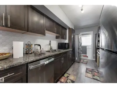 Get Inspired in Britannia Youngstown. This renovated corner unit in Centennial Court is a rare find...