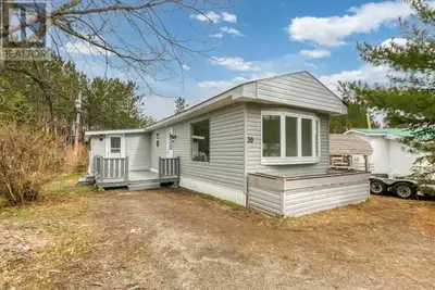 Enjoy easy living in this fully updated mobile home in Hamersveld Park, located in Whitefish. This 2...