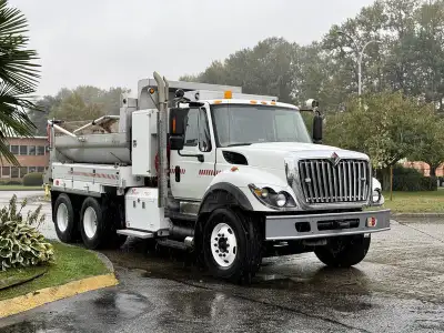 2011 International 7500 tandem axle dump truck with Twister T100 sander, powered by a 9.3L diesel en...