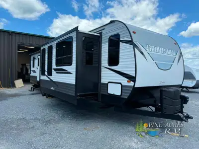 KZ Sportsmen destination trailer 364BH highlights: Middle Bunkhouse Tri-Fold Sofa Patio Door Firepla...
