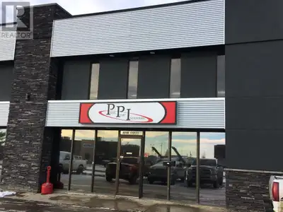 3384 square foot shop and office bay available for lease in Richmond Industrial Park. 12' x 16' over...