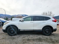 Experience an exceptional driving journey in the 2017 Honda CR-V Touring, featuring an immaculate wh... (image 3)