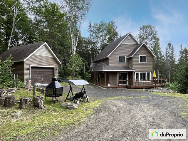 $849,000 - Cottage for sale in St-Donat — photo 1