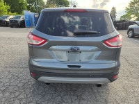 Experience the perfect blend of versatility and efficiency with the 2014 Ford Escape SE, designed fo... (image 5)