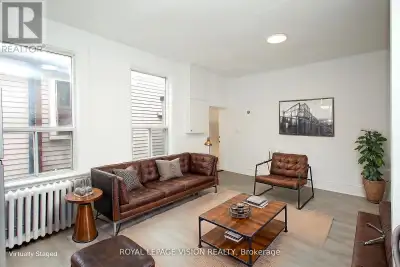 Beautifully remodeled second-floor 3-bedroom residential unit in the heart of Pape Village. This bri...