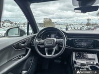 The black 2024 Audi Q7 Komfort, masterfully combines powerful performance with refined luxury. This... (image 8)
